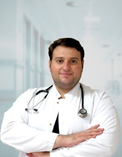Portrait of Dr. M.D. ?enol ACAR, a medical professional providing expert, patient-centered and compassionate healthcare services.